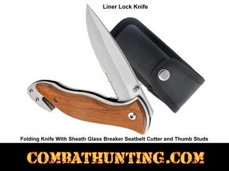 Knife with glass breaker and seatbelt cutter